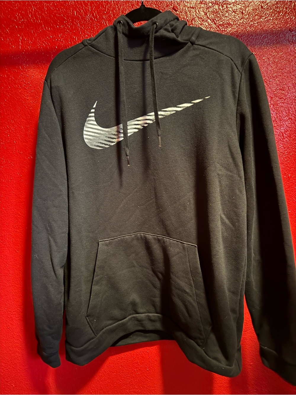 121. Preloved Nike Black Hoodie with Metallic Swoosh
